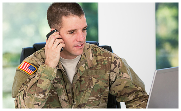 Soldier Speaking on Phone Soldier Speaking on Phone